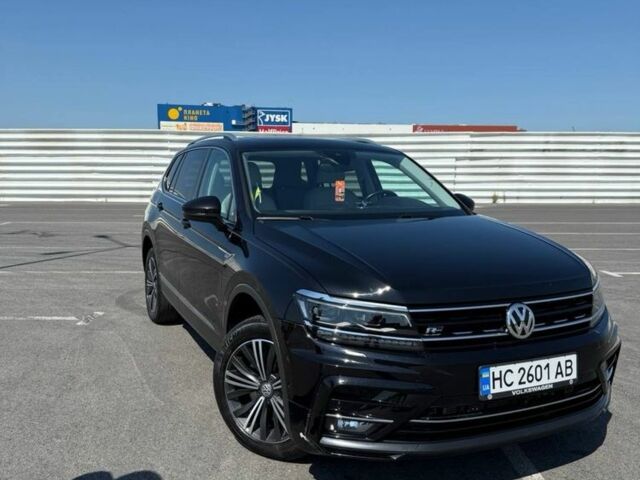 Черный Фольксваген Тигуан, объемом двигателя 2 л и пробегом 160 тыс. км за 24200 $, фото 1 на Automoto.ua