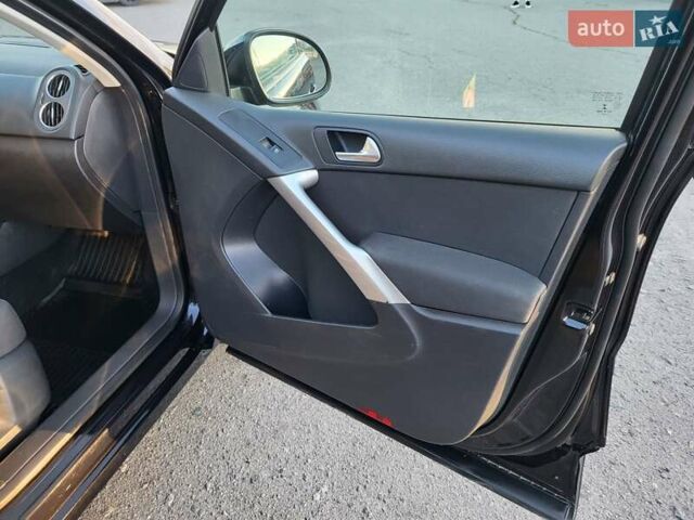 Черный Фольксваген Тигуан, объемом двигателя 1.97 л и пробегом 290 тыс. км за 9899 $, фото 129 на Automoto.ua