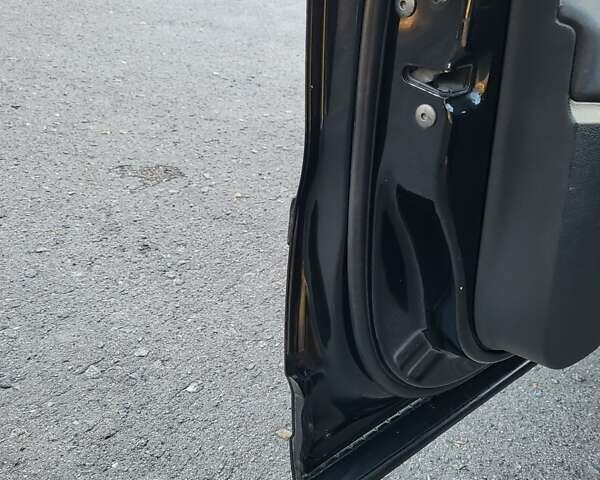 Черный Фольксваген Тигуан, объемом двигателя 1.97 л и пробегом 290 тыс. км за 9899 $, фото 99 на Automoto.ua