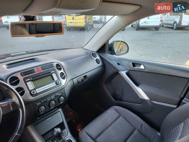 Черный Фольксваген Тигуан, объемом двигателя 1.97 л и пробегом 290 тыс. км за 9899 $, фото 141 на Automoto.ua