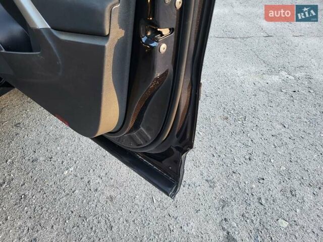 Черный Фольксваген Тигуан, объемом двигателя 1.97 л и пробегом 290 тыс. км за 9899 $, фото 127 на Automoto.ua