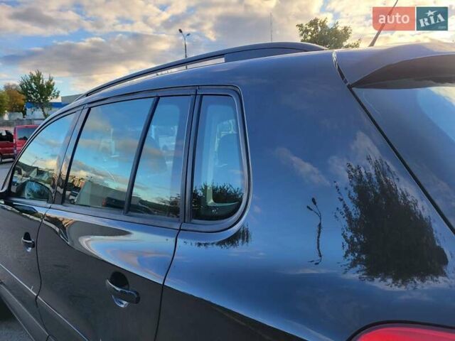 Черный Фольксваген Тигуан, объемом двигателя 1.97 л и пробегом 290 тыс. км за 9899 $, фото 37 на Automoto.ua