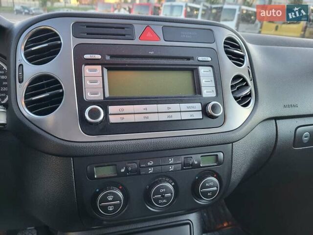 Черный Фольксваген Тигуан, объемом двигателя 1.97 л и пробегом 290 тыс. км за 9899 $, фото 145 на Automoto.ua