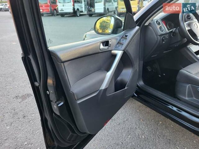 Черный Фольксваген Тигуан, объемом двигателя 1.97 л и пробегом 290 тыс. км за 9899 $, фото 98 на Automoto.ua