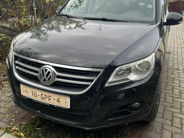 Черный Фольксваген Тигуан, объемом двигателя 1.4 л и пробегом 283 тыс. км за 5589 $, фото 4 на Automoto.ua