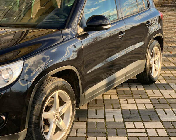 Черный Фольксваген Тигуан, объемом двигателя 1.39 л и пробегом 232 тыс. км за 7950 $, фото 3 на Automoto.ua