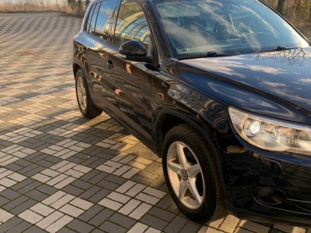 Черный Фольксваген Тигуан, объемом двигателя 1.4 л и пробегом 232 тыс. км за 7950 $, фото 7 на Automoto.ua