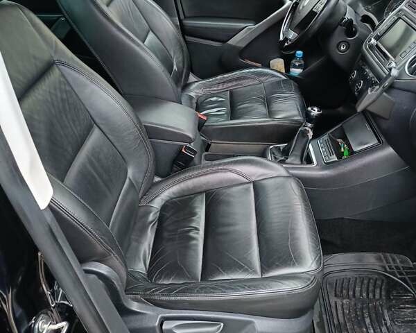 Чорний Фольксваген Тігуан, об'ємом двигуна 1.4 л та пробігом 292 тис. км за 8900 $, фото 7 на Automoto.ua