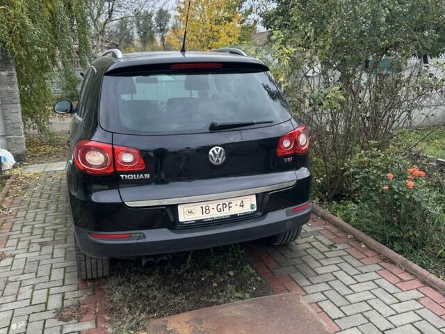 Черный Фольксваген Тигуан, объемом двигателя 1.4 л и пробегом 283 тыс. км за 5589 $, фото 5 на Automoto.ua