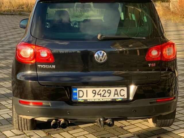 Черный Фольксваген Тигуан, объемом двигателя 1.4 л и пробегом 232 тыс. км за 7950 $, фото 4 на Automoto.ua