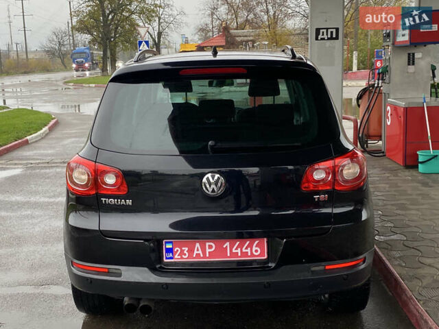 Черный Фольксваген Тигуан, объемом двигателя 1.4 л и пробегом 183 тыс. км за 9300 $, фото 5 на Automoto.ua