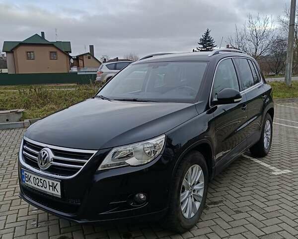 Чорний Фольксваген Тігуан, об'ємом двигуна 1.4 л та пробігом 292 тис. км за 8900 $, фото 1 на Automoto.ua