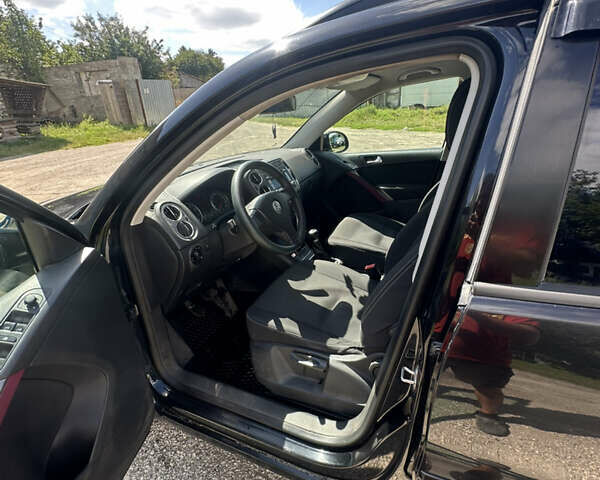 Черный Фольксваген Тигуан, объемом двигателя 1.39 л и пробегом 236 тыс. км за 8800 $, фото 5 на Automoto.ua