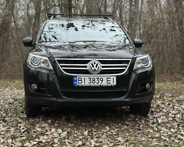 Черный Фольксваген Тигуан, объемом двигателя 1.97 л и пробегом 214 тыс. км за 13500 $, фото 1 на Automoto.ua