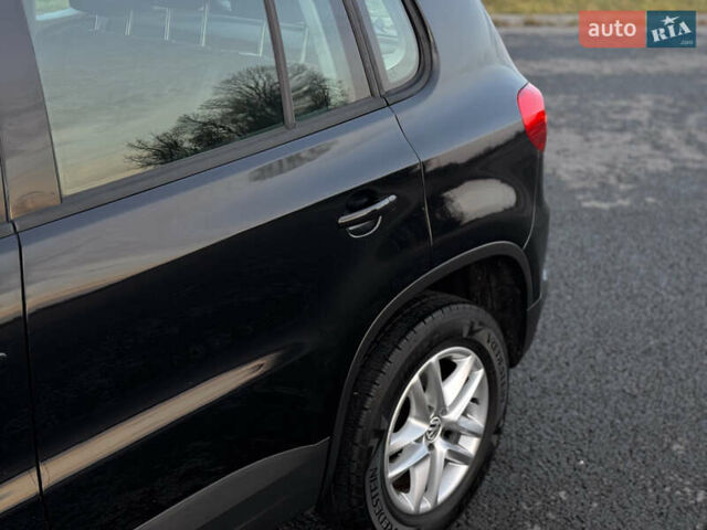 Чорний Фольксваген Тігуан, об'ємом двигуна 1.4 л та пробігом 211 тис. км за 8900 $, фото 19 на Automoto.ua