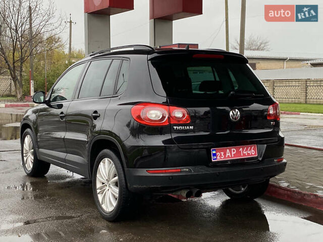 Черный Фольксваген Тигуан, объемом двигателя 1.4 л и пробегом 183 тыс. км за 9300 $, фото 3 на Automoto.ua