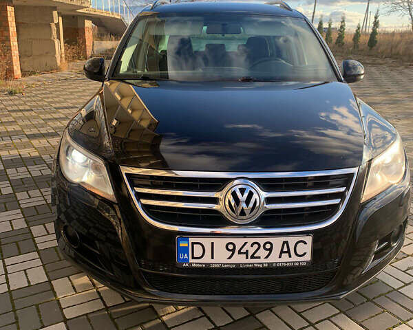 Черный Фольксваген Тигуан, объемом двигателя 1.39 л и пробегом 232 тыс. км за 7950 $, фото 1 на Automoto.ua