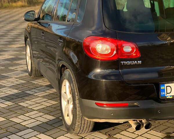 Черный Фольксваген Тигуан, объемом двигателя 1.39 л и пробегом 232 тыс. км за 7950 $, фото 17 на Automoto.ua
