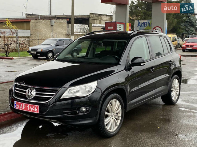Черный Фольксваген Тигуан, объемом двигателя 1.4 л и пробегом 183 тыс. км за 9300 $, фото 1 на Automoto.ua