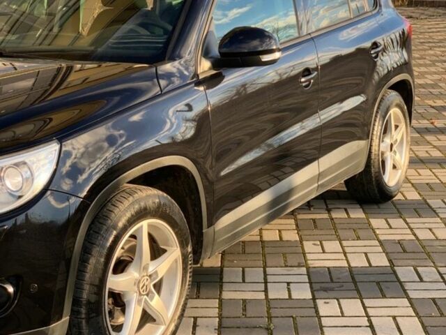 Черный Фольксваген Тигуан, объемом двигателя 1.4 л и пробегом 232 тыс. км за 7950 $, фото 1 на Automoto.ua