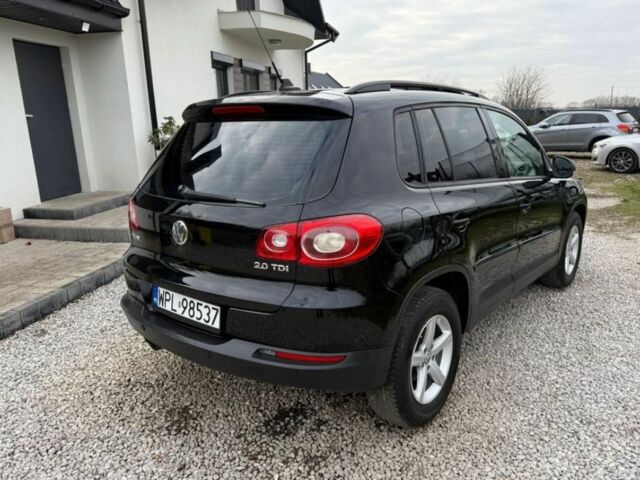 Черный Фольксваген Тигуан, объемом двигателя 2 л и пробегом 285 тыс. км за 2700 $, фото 4 на Automoto.ua