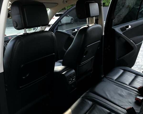 Чорний Фольксваген Тігуан, об'ємом двигуна 1.97 л та пробігом 276 тис. км за 12000 $, фото 4 на Automoto.ua