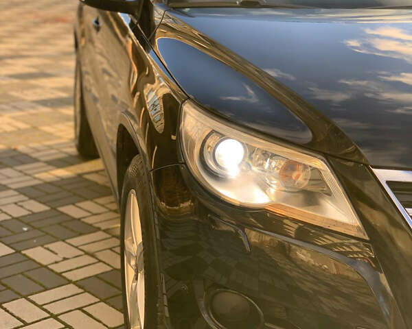 Черный Фольксваген Тигуан, объемом двигателя 1.39 л и пробегом 232 тыс. км за 7950 $, фото 6 на Automoto.ua