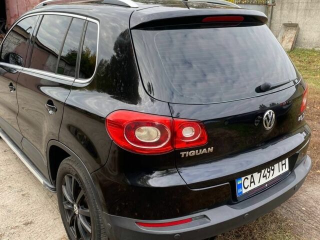 Черный Фольксваген Тигуан, объемом двигателя 2 л и пробегом 380 тыс. км за 8499 $, фото 8 на Automoto.ua