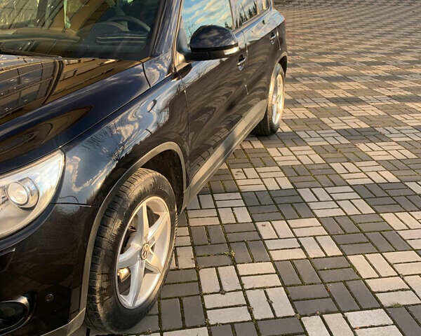 Черный Фольксваген Тигуан, объемом двигателя 1.39 л и пробегом 232 тыс. км за 7950 $, фото 11 на Automoto.ua