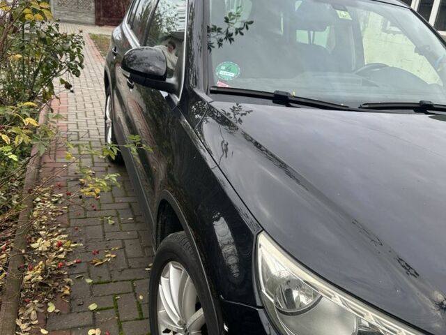 Черный Фольксваген Тигуан, объемом двигателя 1.4 л и пробегом 283 тыс. км за 5589 $, фото 3 на Automoto.ua