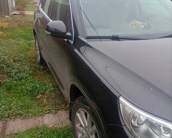 Черный Фольксваген Тигуан, объемом двигателя 1.4 л и пробегом 300 тыс. км за 9300 $, фото 5 на Automoto.ua