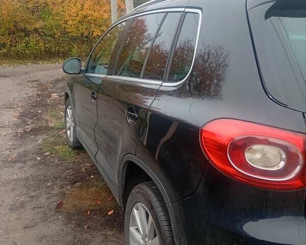 Черный Фольксваген Тигуан, объемом двигателя 1.4 л и пробегом 300 тыс. км за 9300 $, фото 10 на Automoto.ua