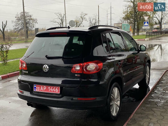 Черный Фольксваген Тигуан, объемом двигателя 1.4 л и пробегом 183 тыс. км за 9300 $, фото 4 на Automoto.ua