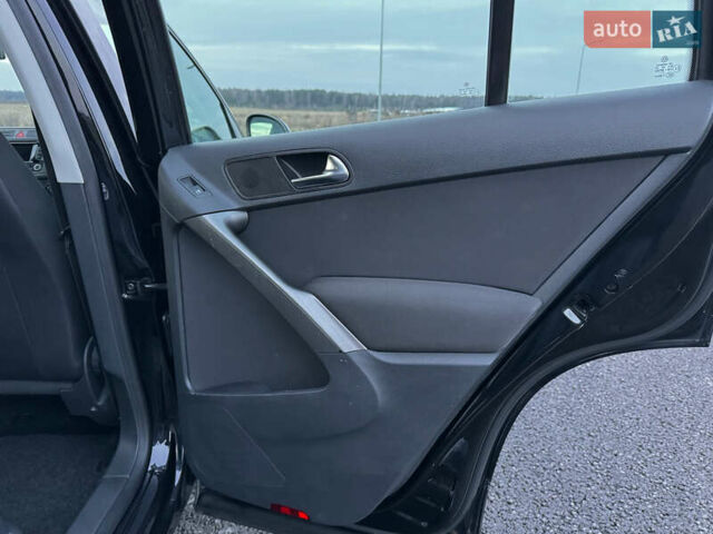 Чорний Фольксваген Тігуан, об'ємом двигуна 1.4 л та пробігом 211 тис. км за 8900 $, фото 46 на Automoto.ua