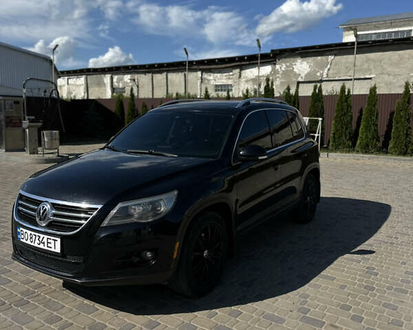 Чорний Фольксваген Тігуан, об'ємом двигуна 2 л та пробігом 270 тис. км за 11500 $, фото 13 на Automoto.ua