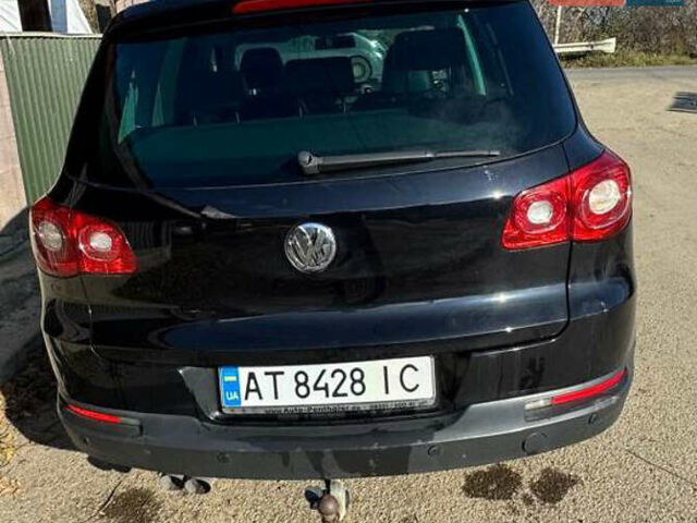 Чорний Фольксваген Тігуан, об'ємом двигуна 2 л та пробігом 270 тис. км за 11831 $, фото 1 на Automoto.ua