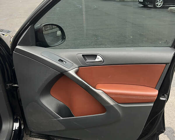 Черный Фольксваген Тигуан, объемом двигателя 1.98 л и пробегом 245 тыс. км за 9400 $, фото 18 на Automoto.ua