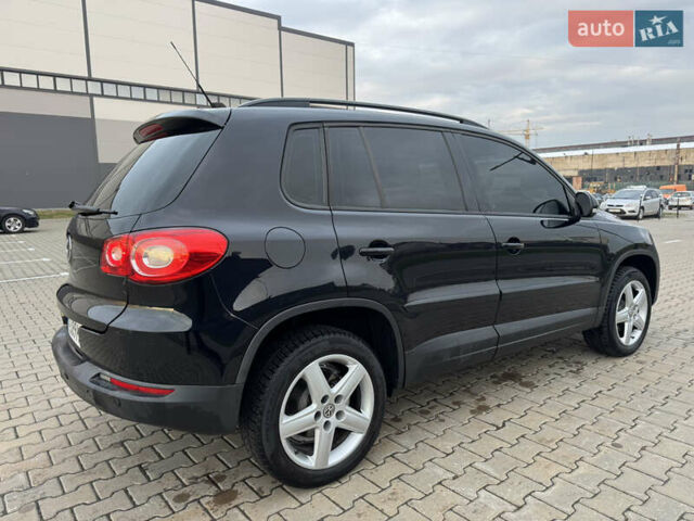Чорний Фольксваген Тігуан, об'ємом двигуна 2 л та пробігом 290 тис. км за 10200 $, фото 14 на Automoto.ua