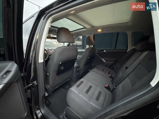 Чорний Фольксваген Тігуан, об'ємом двигуна 2 л та пробігом 290 тис. км за 10200 $, фото 26 на Automoto.ua