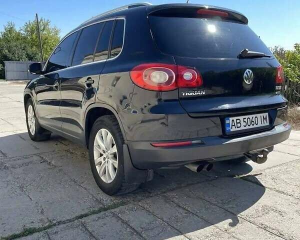 Чорний Фольксваген Тігуан, об'ємом двигуна 2 л та пробігом 300 тис. км за 9600 $, фото 3 на Automoto.ua