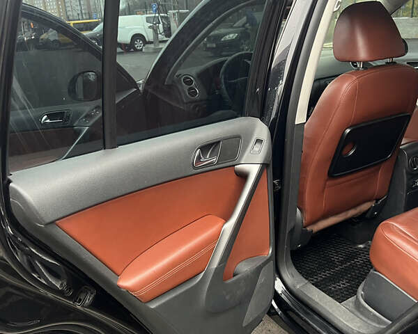 Черный Фольксваген Тигуан, объемом двигателя 1.98 л и пробегом 245 тыс. км за 9400 $, фото 13 на Automoto.ua