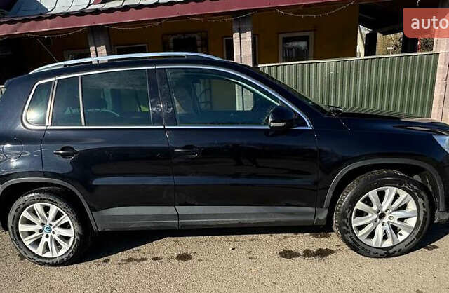 Чорний Фольксваген Тігуан, об'ємом двигуна 2 л та пробігом 270 тис. км за 11831 $, фото 2 на Automoto.ua