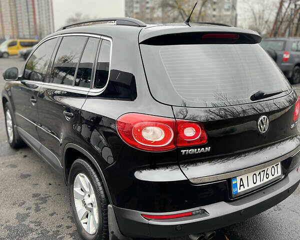 Черный Фольксваген Тигуан, объемом двигателя 1.98 л и пробегом 245 тыс. км за 9400 $, фото 7 на Automoto.ua