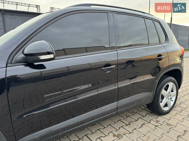 Чорний Фольксваген Тігуан, об'ємом двигуна 2 л та пробігом 290 тис. км за 10200 $, фото 21 на Automoto.ua