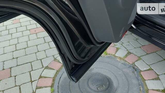 Чорний Фольксваген Тігуан, об'ємом двигуна 2 л та пробігом 266 тис. км за 12777 $, фото 56 на Automoto.ua