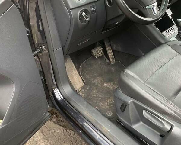 Чорний Фольксваген Тігуан, об'ємом двигуна 2 л та пробігом 199 тис. км за 10700 $, фото 10 на Automoto.ua