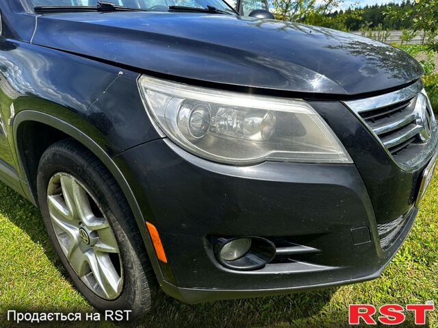 Чорний Фольксваген Тігуан, об'ємом двигуна 2 л та пробігом 309 тис. км за 8700 $, фото 2 на Automoto.ua