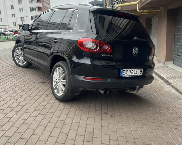 Черный Фольксваген Тигуан, объемом двигателя 2 л и пробегом 317 тыс. км за 10900 $, фото 13 на Automoto.ua