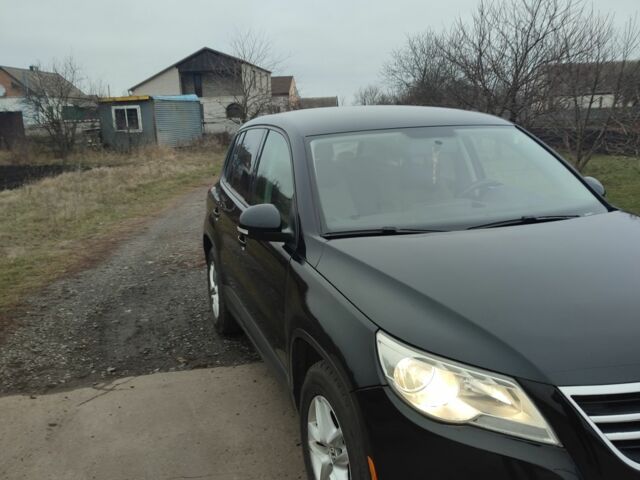 Черный Фольксваген Тигуан, объемом двигателя 2 л и пробегом 198 тыс. км за 9390 $, фото 1 на Automoto.ua