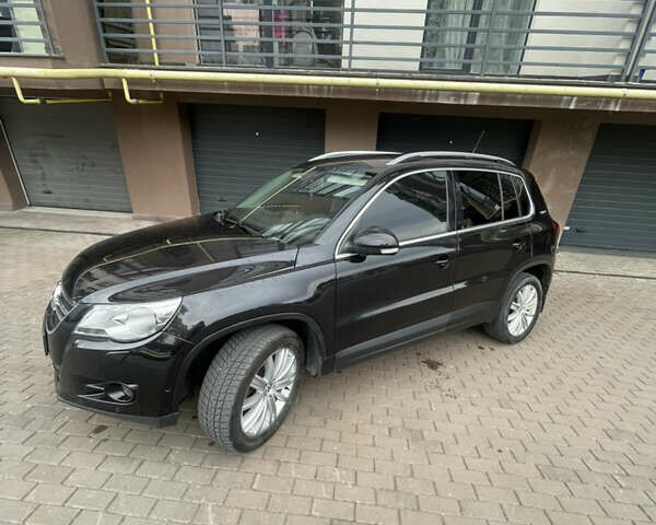 Черный Фольксваген Тигуан, объемом двигателя 2 л и пробегом 317 тыс. км за 10900 $, фото 21 на Automoto.ua